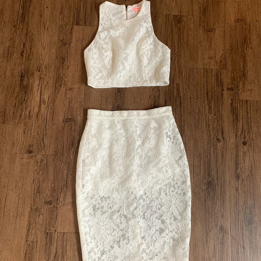 Two piece white lace pencil skirt and top